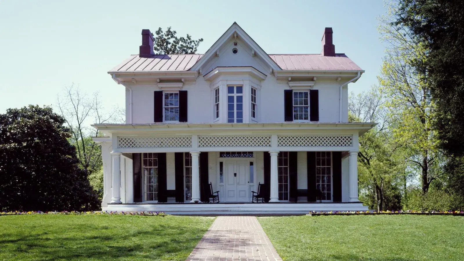 Cedar Hill, the Frederick Douglass House, a white nineteenth-century home with a columned porch, in the Anacostia neighborhood of Washington, D.C.