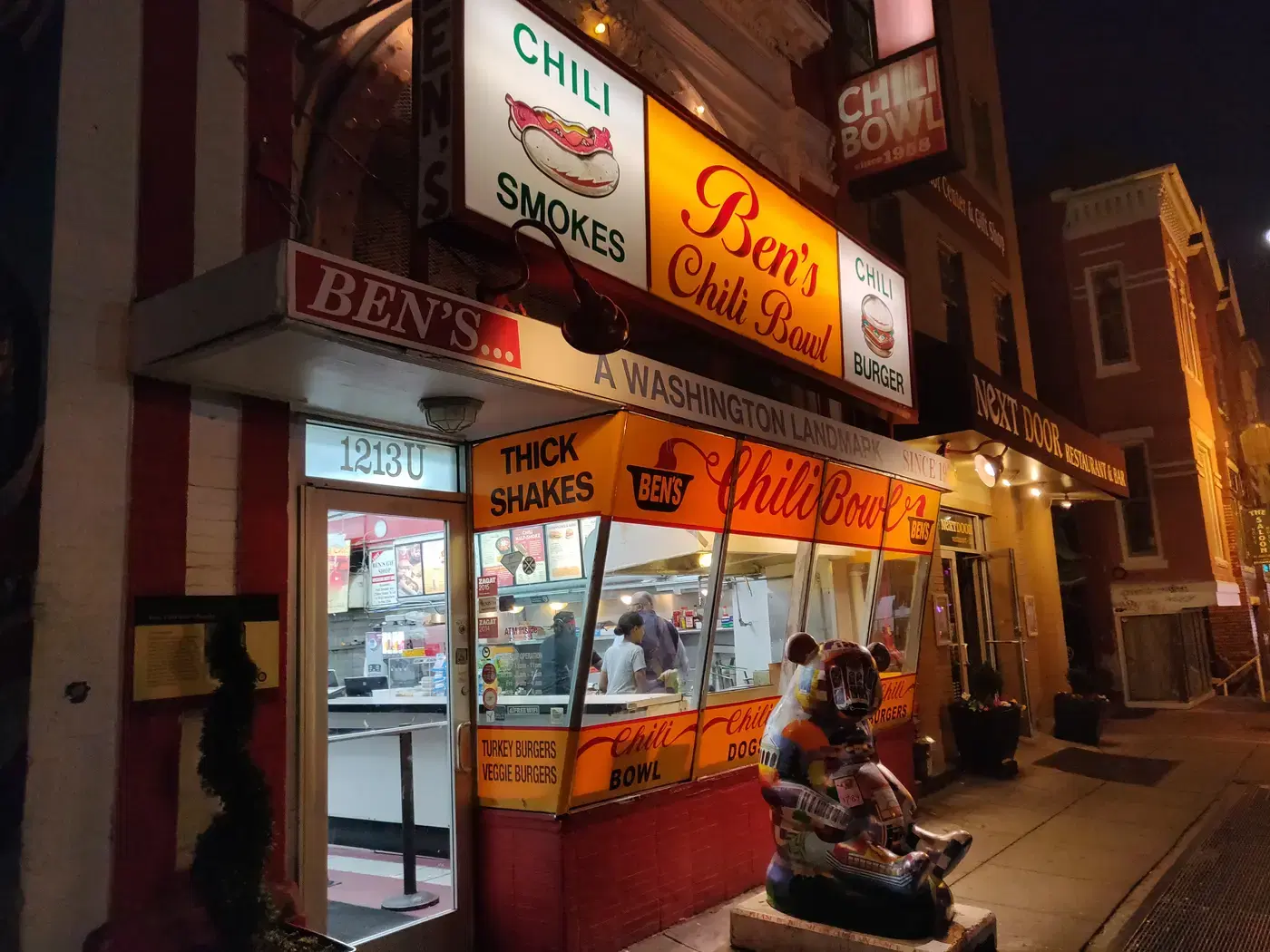 The neon signs of Ben's Chili Bowl glowing at night at 1213 U Street NW, Washington, D.C.
