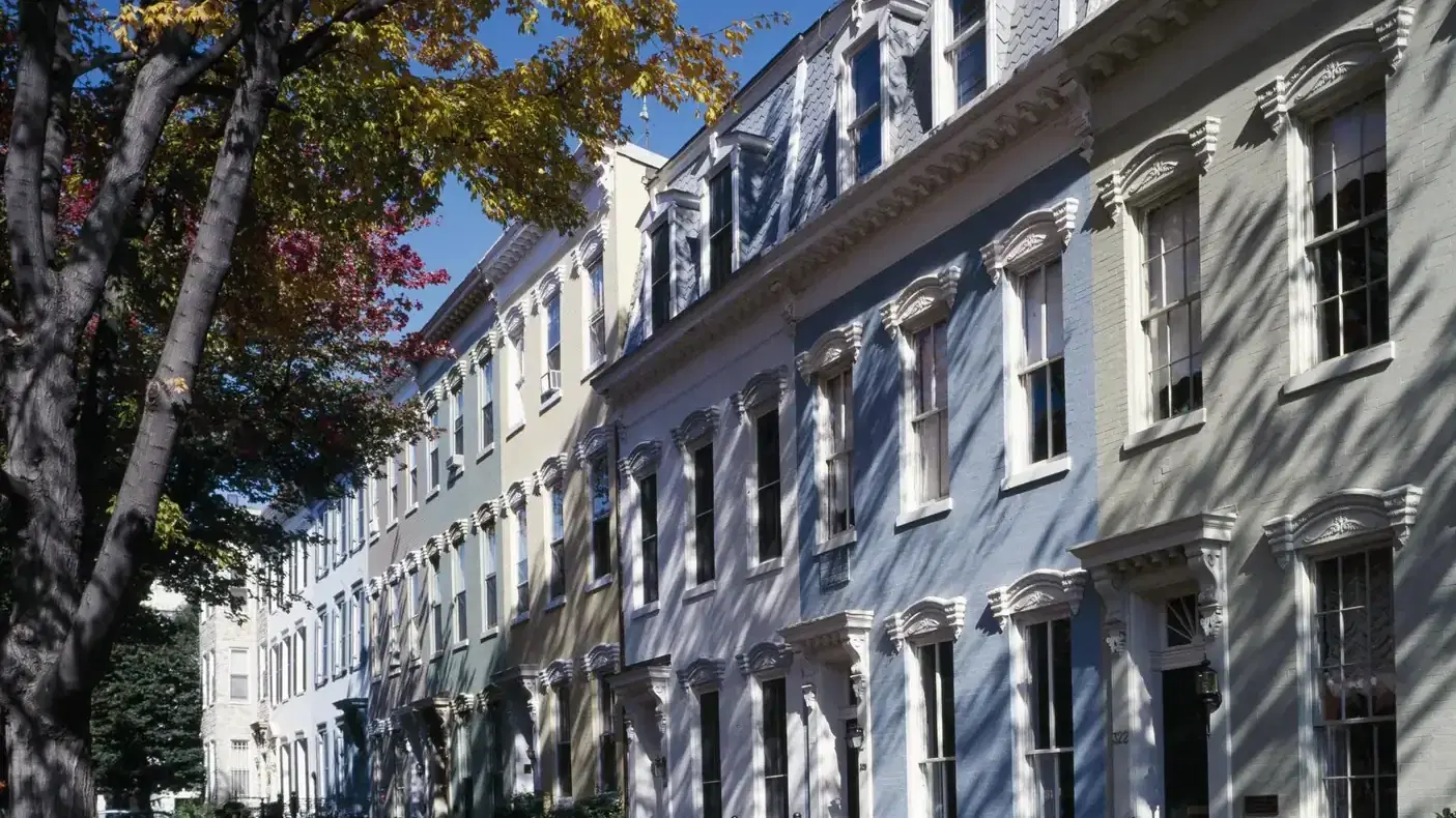 Row houses on a tree-lined Capitol Hill street in autumn, Washington, DC