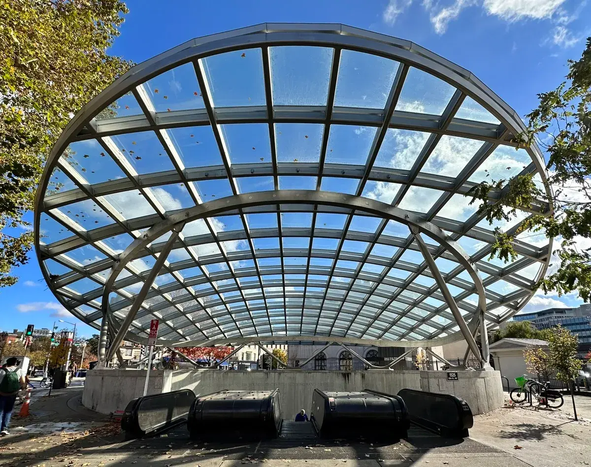 The glass canopy over the escalators at Dupont Circle station's north entrance