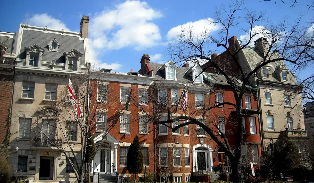 Gilded Age mansions with embassy flags flying along Massachusetts Avenue NW, Washington, D.C.
