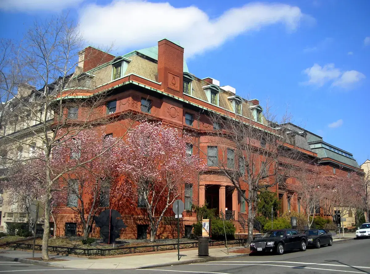 The Phillips Collection's brick corner with magnolias in bloom, Washington, D.C.