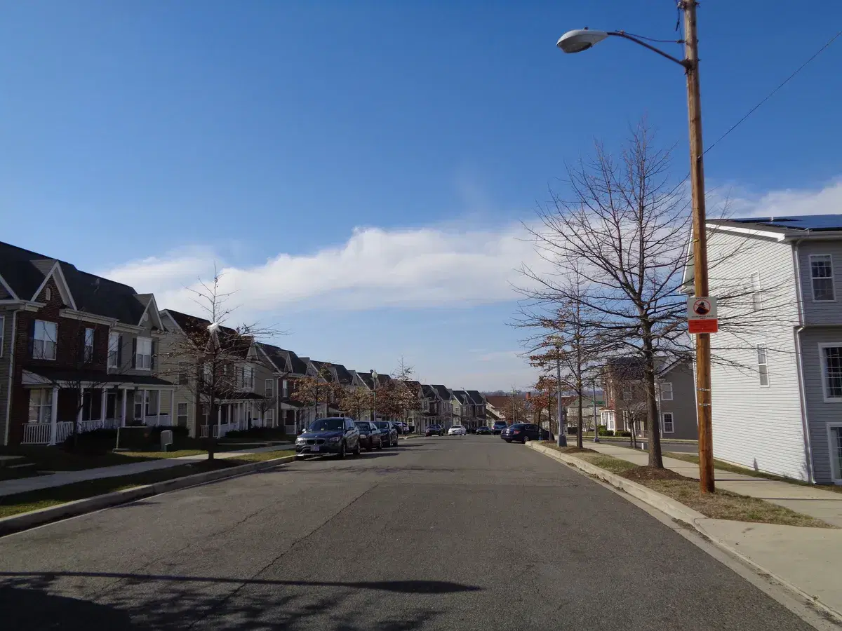 A row of townhouses with porches along 57th Street SE in Capitol View