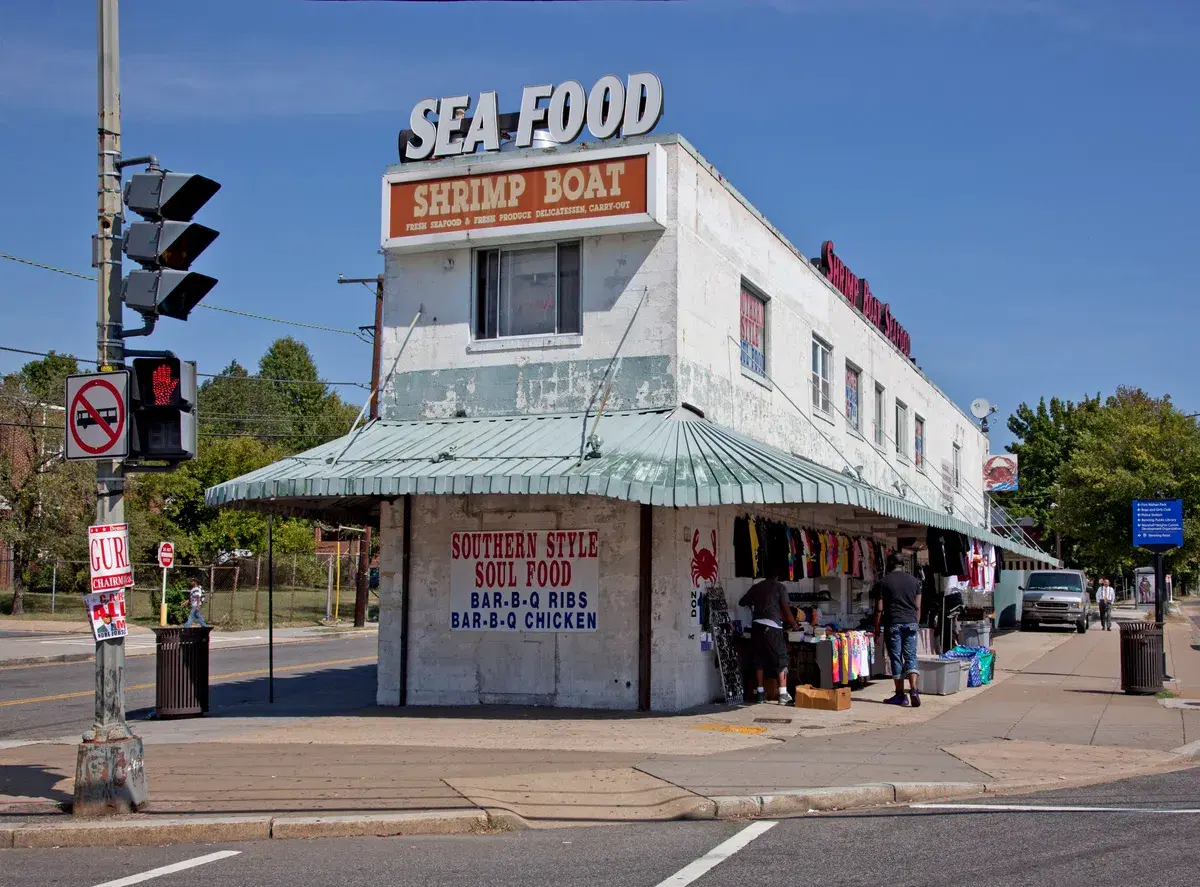 The white Shrimp Boat building with its Sea Food and Shrimp Boat signs at Benning Road and East Capitol Street