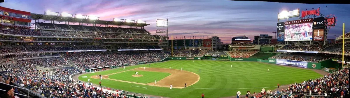 Panoramic view of the field, crowd, and scoreboard at Nationals Park at sunset, Washington, D.C.