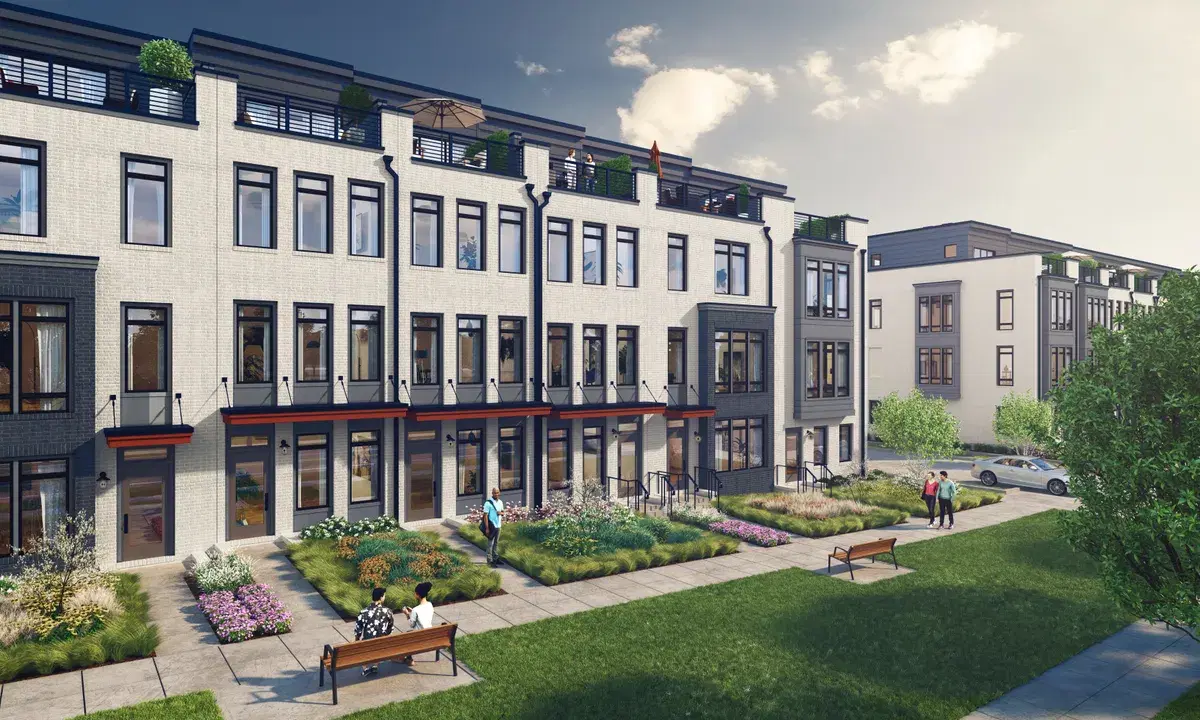 Rendering of a row of four-story white brick Atwood townhomes with roof terraces, facing a landscaped green