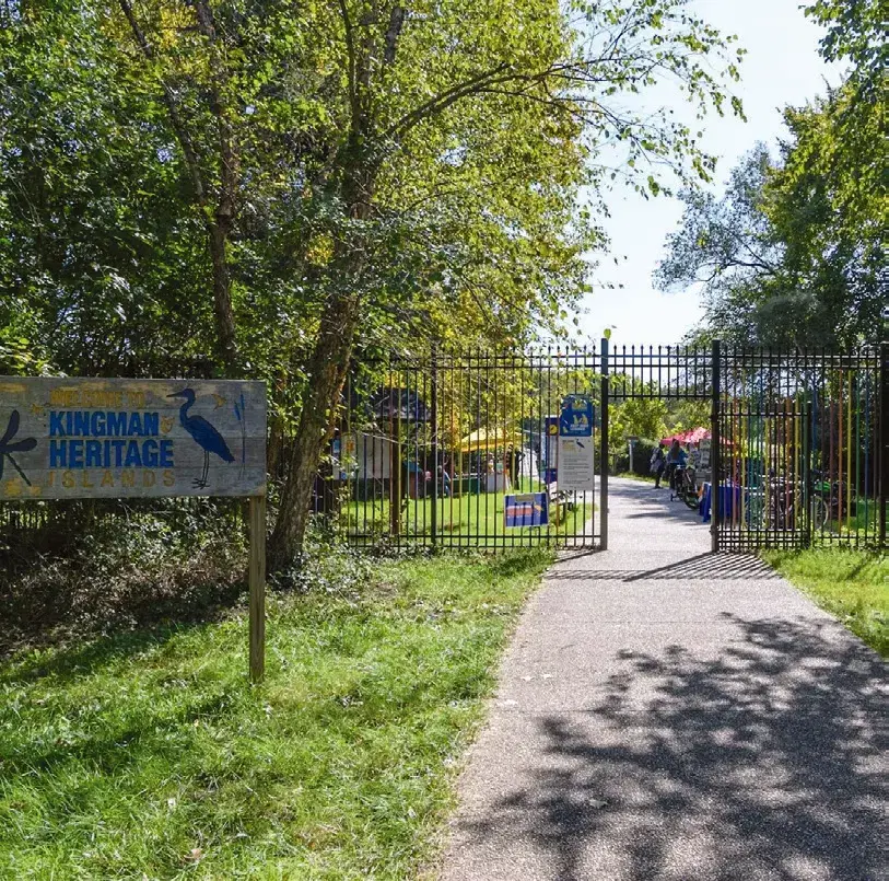 The Kingman Heritage sign and the gate at the start of the path onto the islands