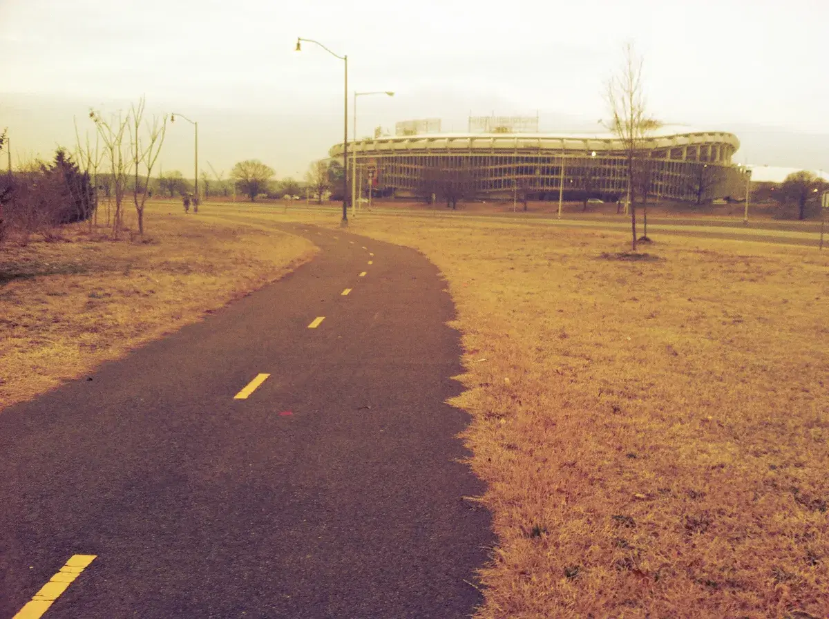 The Anacostia Riverwalk Trail curving along the river toward RFK Stadium