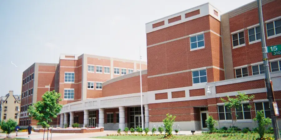 The Columbia Heights Educational Campus, brick and glass, rising over 16th Street NW, Washington, D.C.