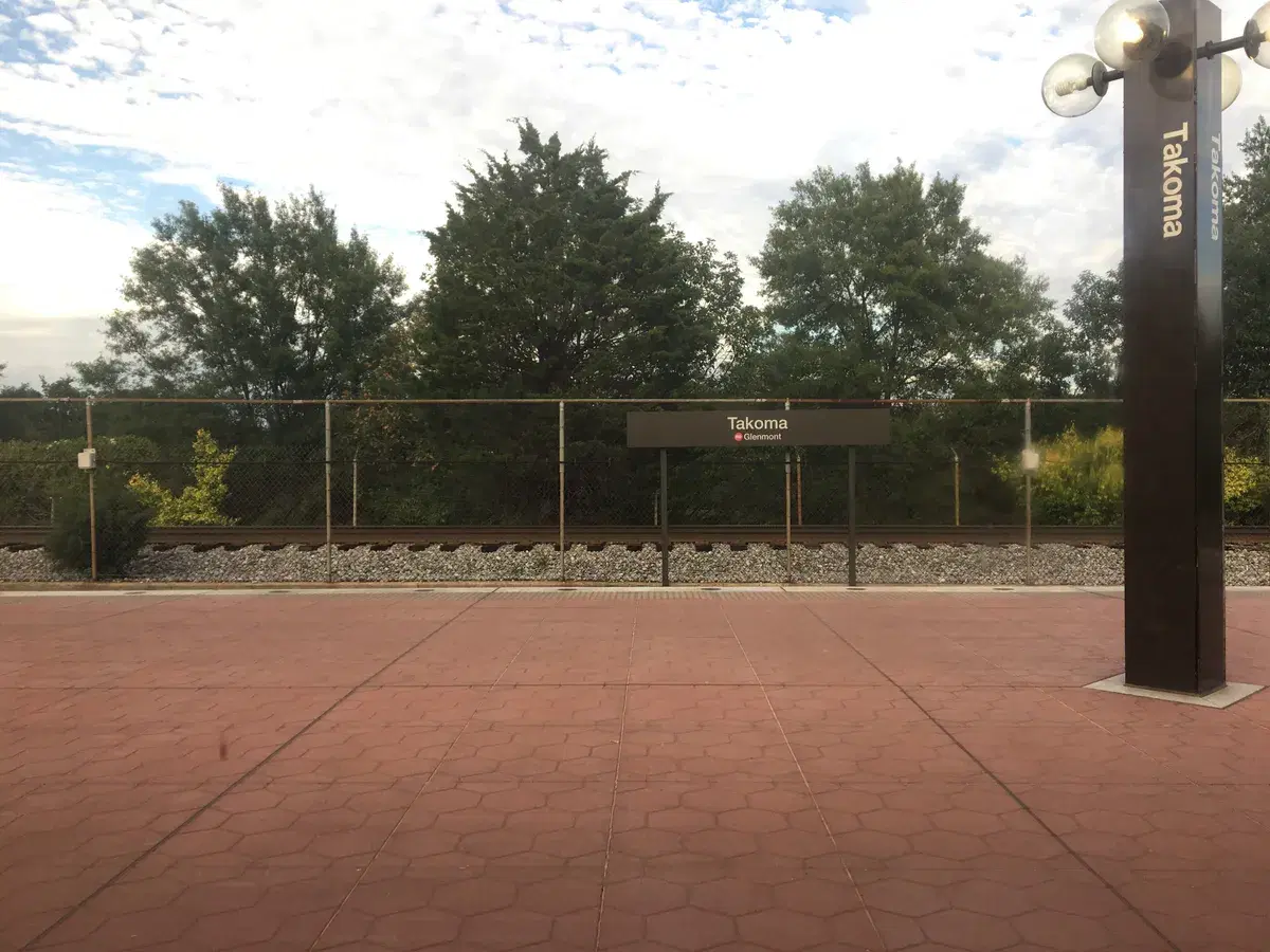 The platform at Takoma Metro station with its station sign