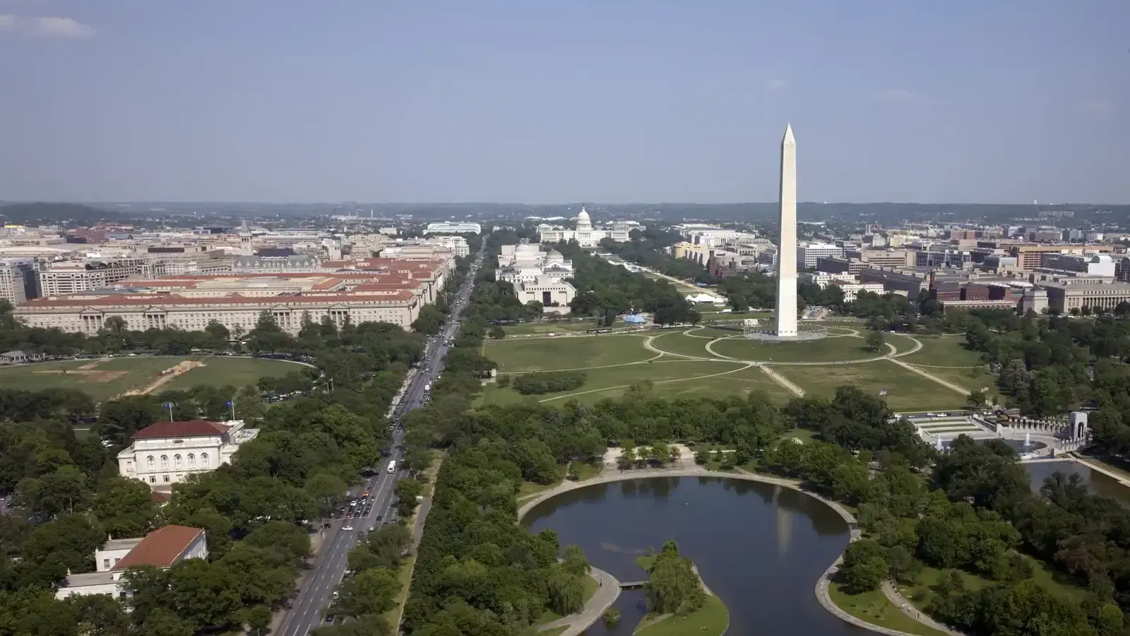 Aerial view over the National Mall toward the U.S. Capitol.