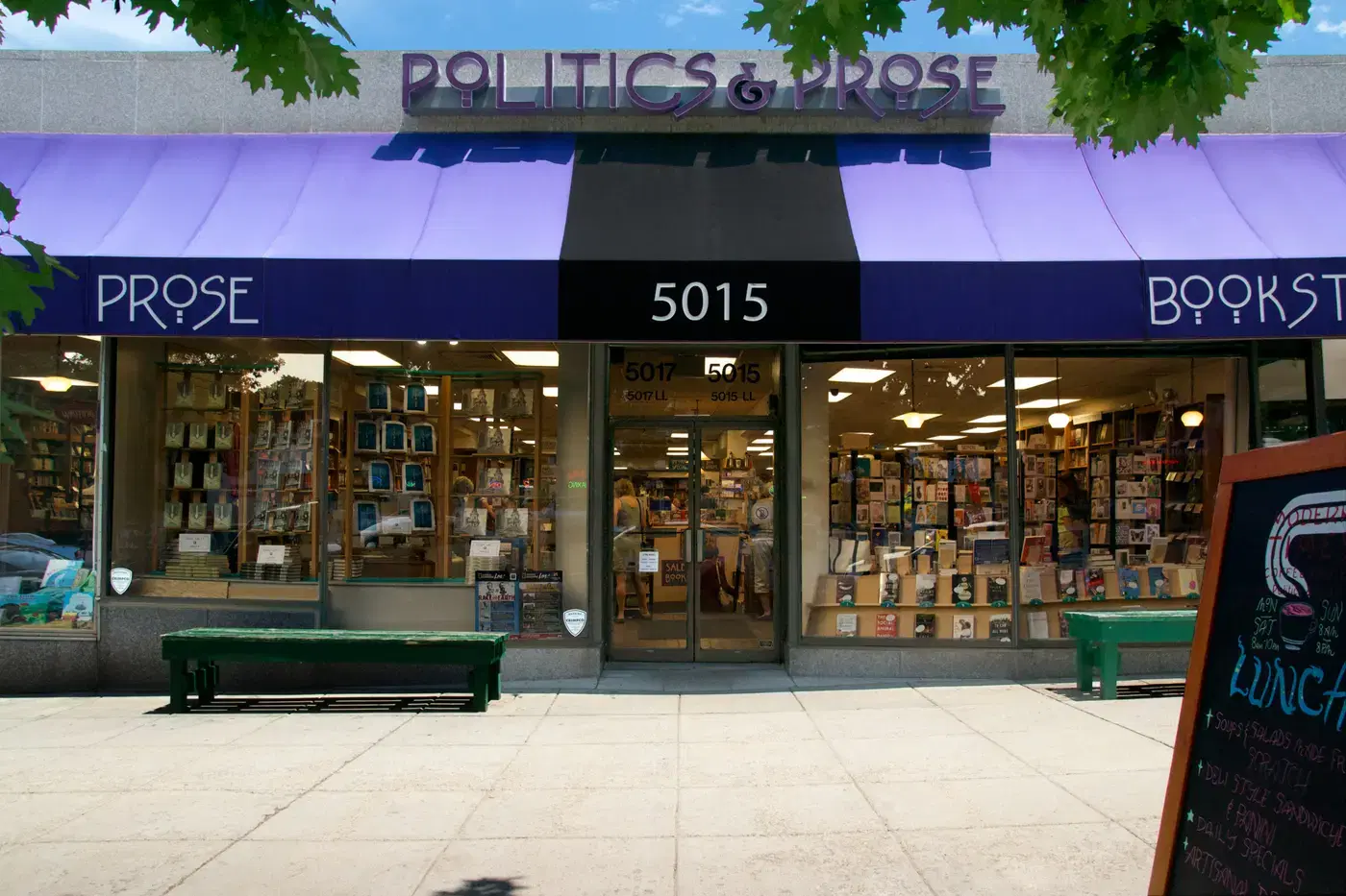 The purple awning and book-filled windows of Politics and Prose bookstore at 5015 Connecticut Avenue NW, Washington, D.C.