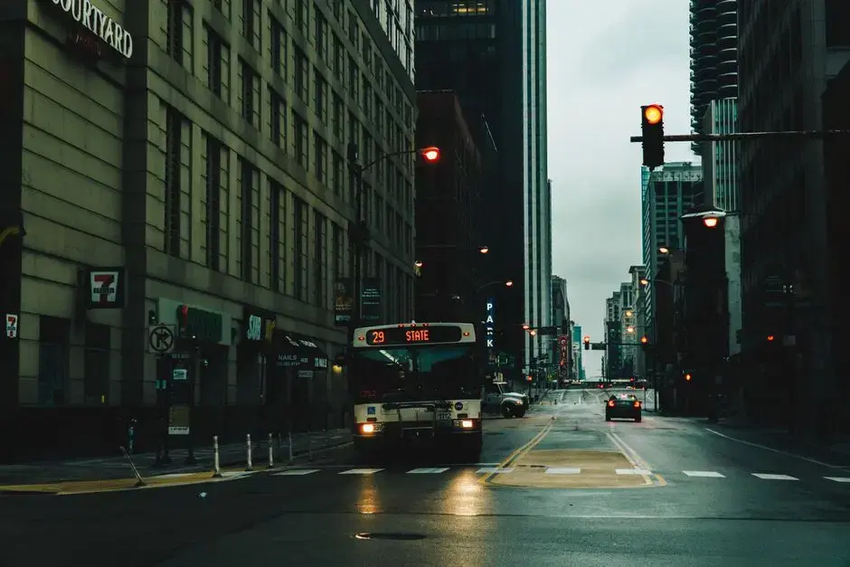 Moody rainy-day US downtown street with route-29 city bus approaching