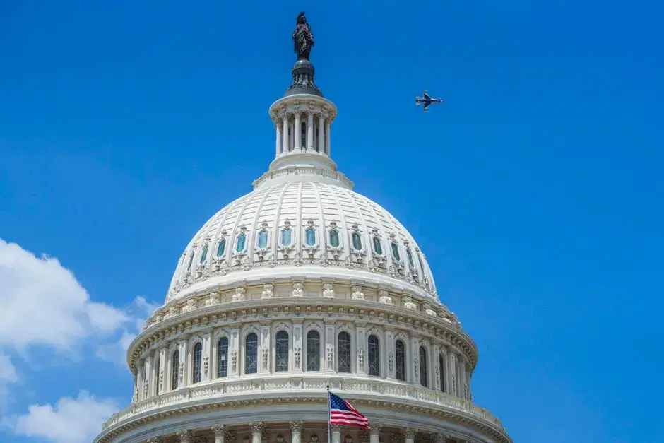 The real US Capitol dome with flag, clean blue sky - honest match for a Capitol Hill card