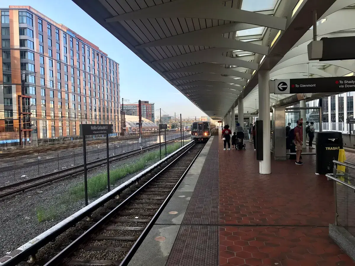 A Red Line train arriving at the NoMa–Gallaudet U station platform